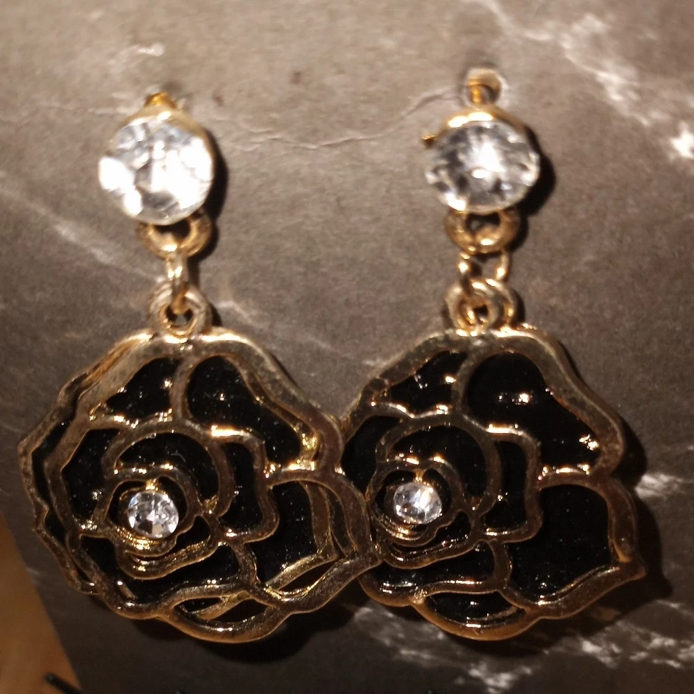black and gold toned rose dangle earrings
